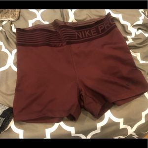 Maroon Nike Pro shorts